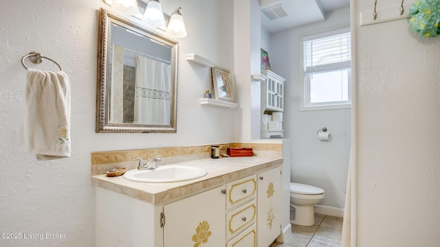 1014 E Oak St, Louisville, KY 40204 - bathroom featuring vanity, toilet, tile patterned flooring, a shower with shower curtain, and backsplash