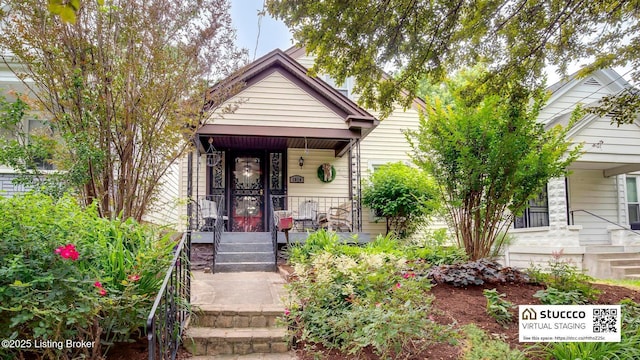 1014 E Oak St, Louisville, KY 40204 - shotgun-style home with covered porch