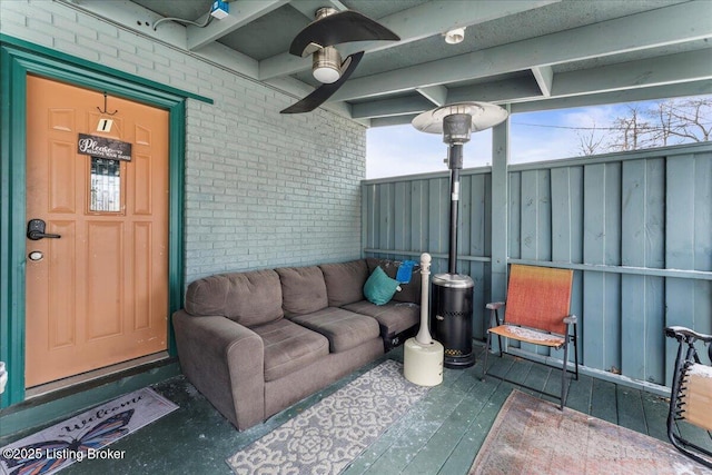 doorway to property with ceiling fan