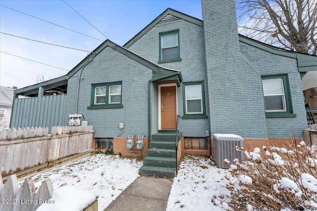 view of front of home featuring central AC unit
