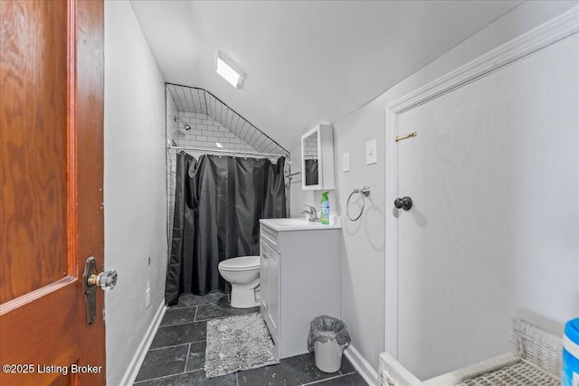 bathroom with toilet, a shower with shower curtain, and vanity