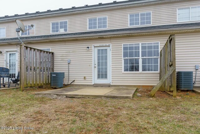 141-147 Darby Woods Ct, Radcliff, KY 40160 - back of property featuring a yard, central AC unit, and a patio area
