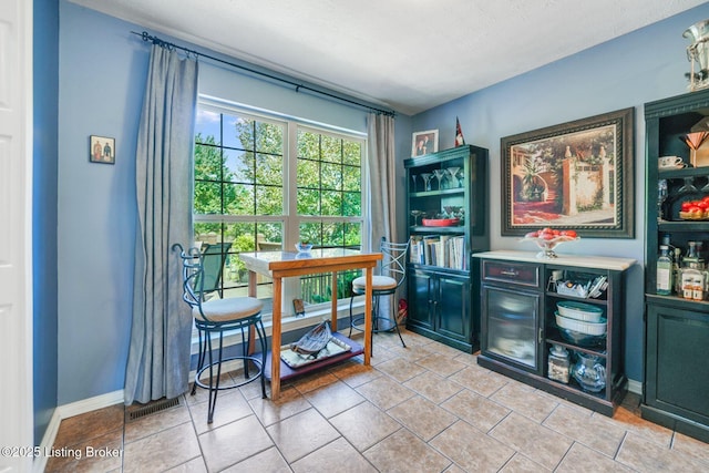 interior space featuring light tile patterned floors