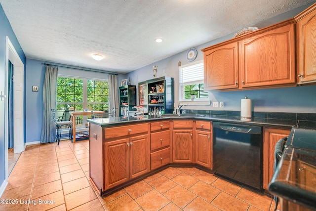 kitchen with electric range oven, black dishwasher, light tile patterned floors, kitchen peninsula, and a textured ceiling