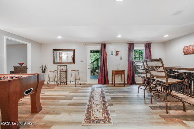 dining area featuring light wood-type flooring