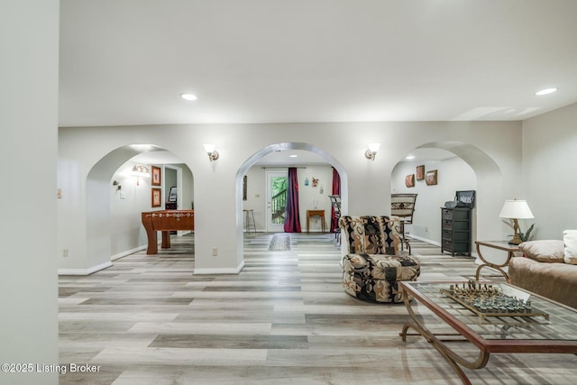 living room with light hardwood / wood-style flooring