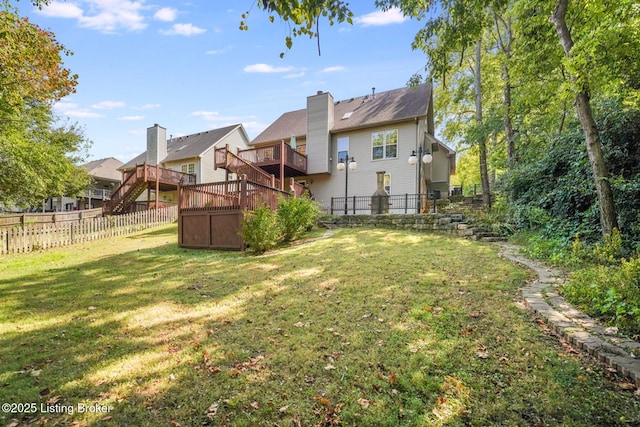 view of yard with a wooden deck