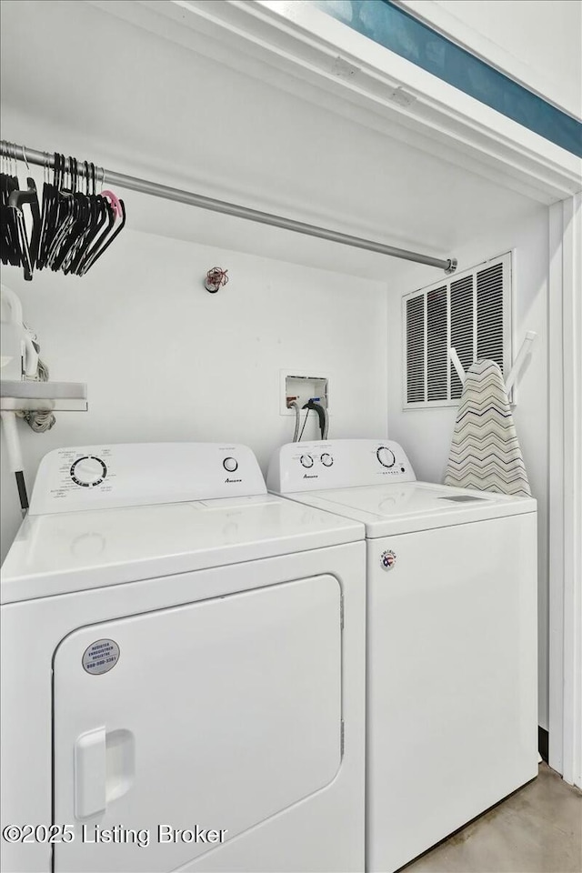 laundry area featuring washer and clothes dryer