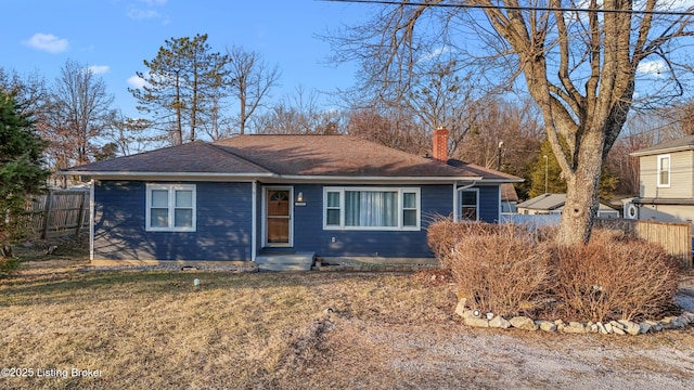 ranch-style house featuring a front lawn