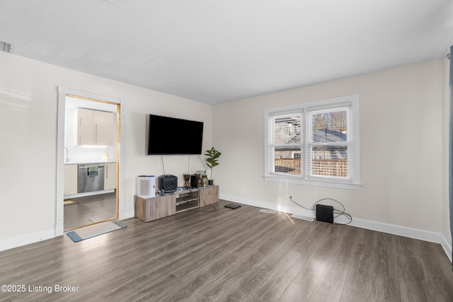 unfurnished living room with hardwood / wood-style floors