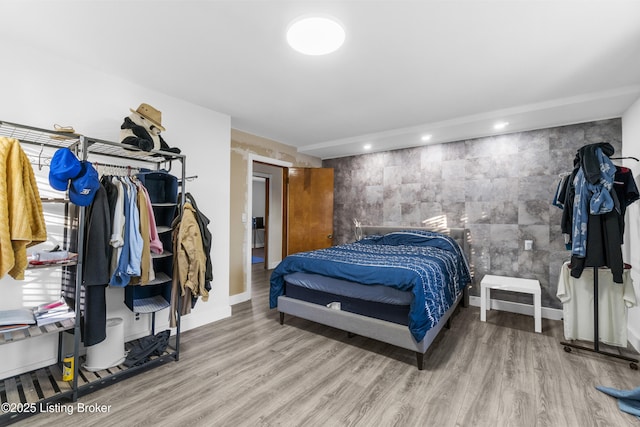 bedroom featuring hardwood / wood-style flooring