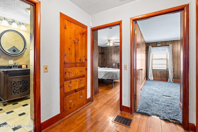 hallway featuring light wood-type flooring