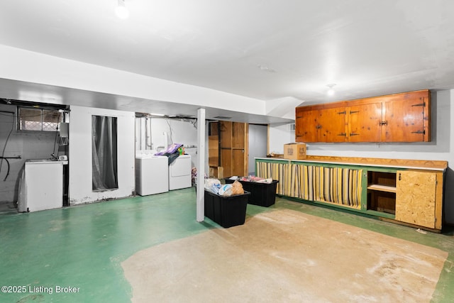 basement with washing machine and clothes dryer