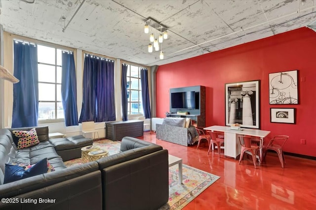 living room with concrete flooring