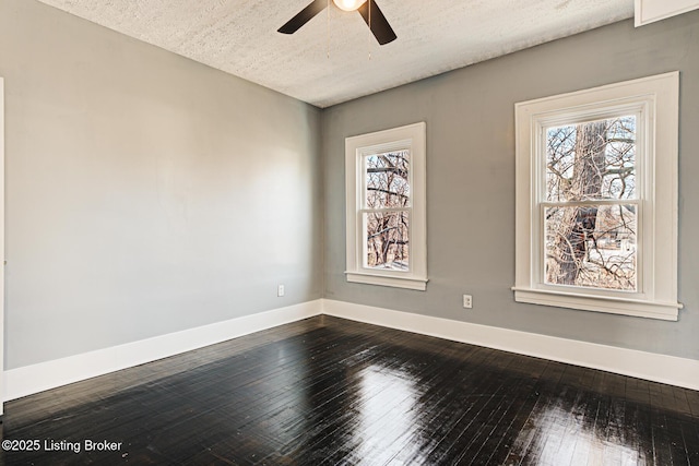 spare room with wood-type flooring, ceiling fan, and a textured ceiling