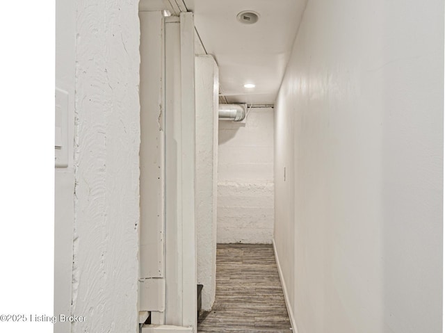 corridor featuring hardwood / wood-style flooring