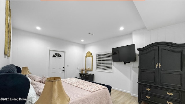 bedroom with light hardwood / wood-style floors