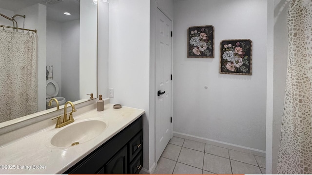 bathroom with tile patterned flooring, vanity, and curtained shower