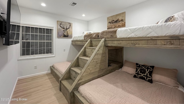 bedroom with light hardwood / wood-style floors