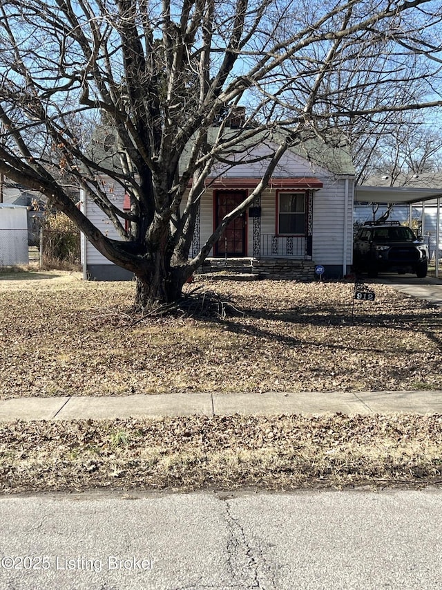 view of front of house featuring a carport