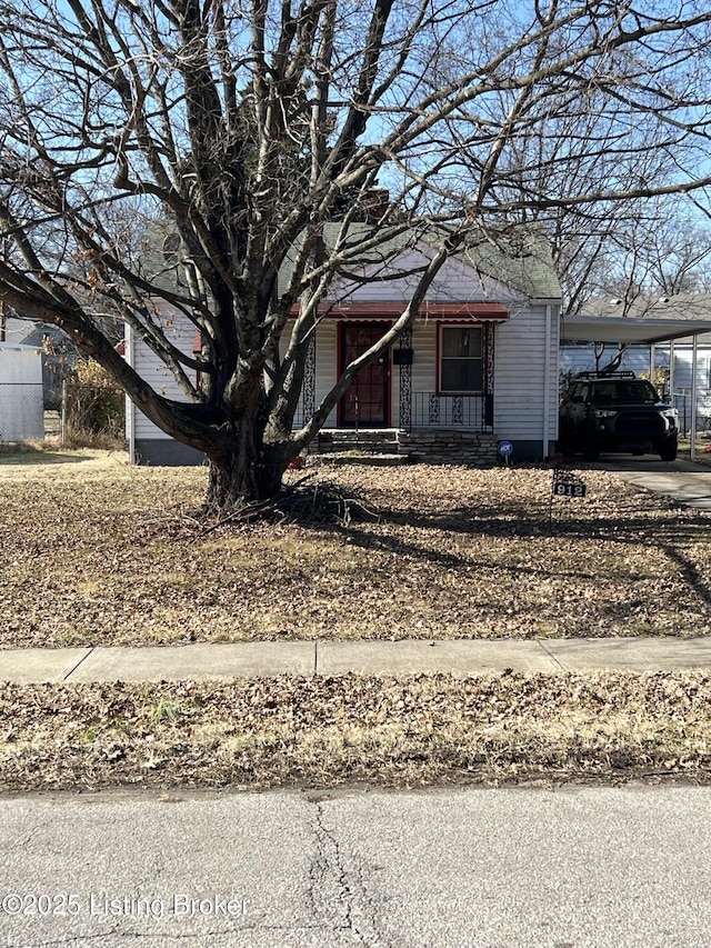 view of front of house featuring a carport