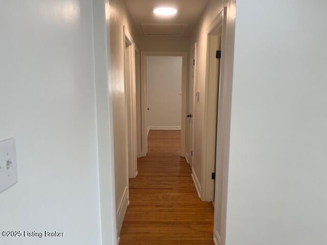 corridor featuring light wood-type flooring