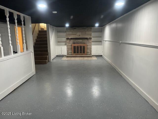 unfurnished living room with a fireplace