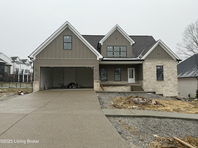 view of front of home with a garage and covered porch