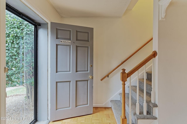 foyer featuring light parquet flooring