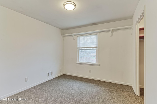 unfurnished bedroom with carpet floors