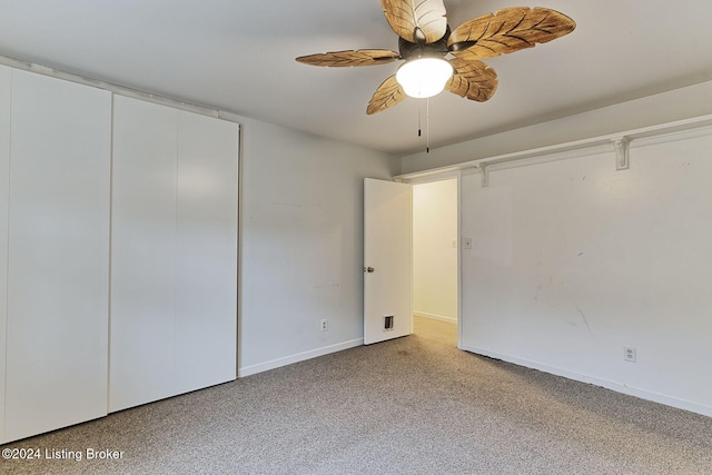 unfurnished bedroom featuring ceiling fan