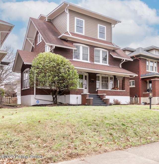 view of front of house featuring a front lawn and a porch