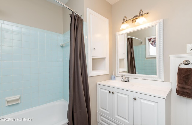 bathroom with shower / bath combo and vanity