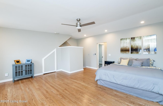 bedroom featuring hardwood / wood-style flooring and ceiling fan