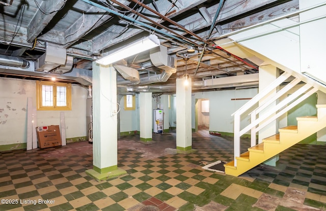 basement featuring gas water heater