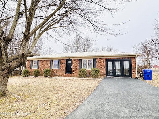 single story home featuring french doors