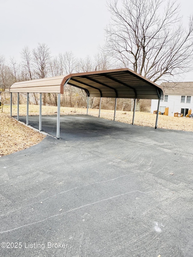 view of car parking featuring a carport