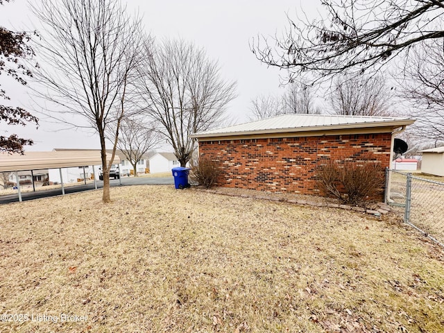 view of yard with a carport