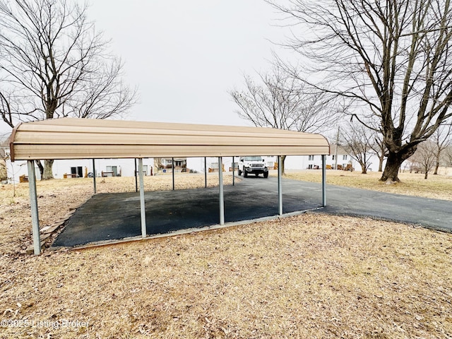 view of parking featuring a carport