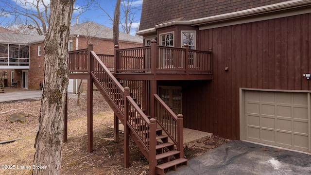 view of play area featuring a deck and stairs