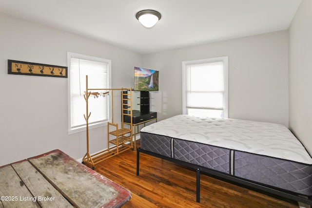 bedroom featuring hardwood / wood-style flooring