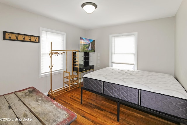 bedroom featuring hardwood / wood-style floors