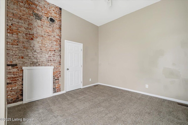 2715 W Market St, Louisville, KY 40212 - carpeted spare room with baseboards