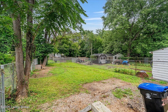 2715 W Market St, Louisville, KY 40212 - fenced backyard with a storage shed
