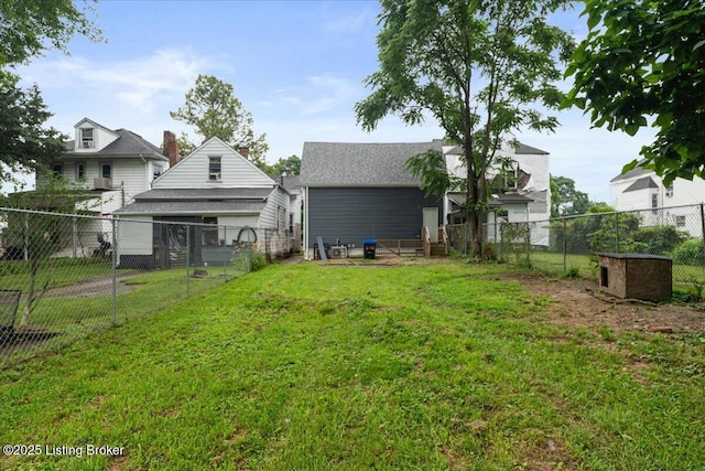 2715 W Market St, Louisville, KY 40212 - back of house with a fenced backyard