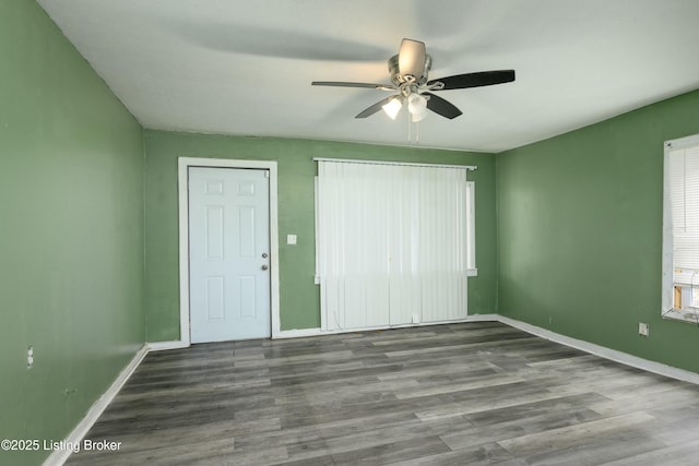 unfurnished bedroom featuring hardwood / wood-style flooring and ceiling fan