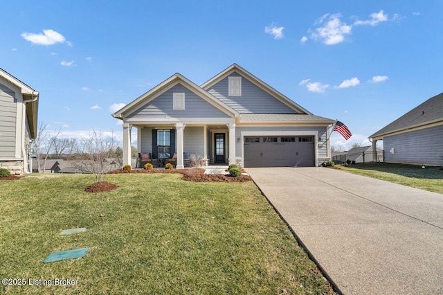 view of front of house with concrete driveway, an attached garage, covered porch, and a front lawn