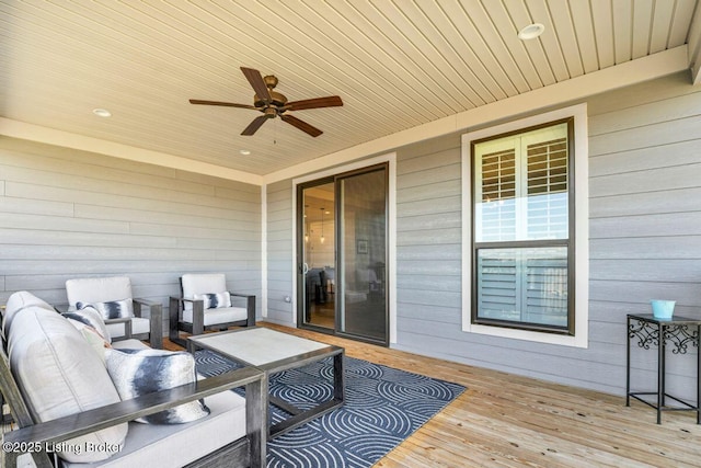 wooden deck with ceiling fan