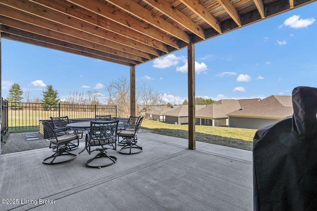 view of patio / terrace featuring outdoor dining space and fence