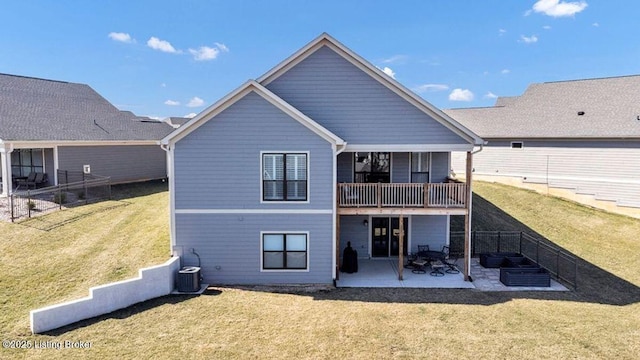 back of house with a patio area, a fenced backyard, central AC unit, and a yard